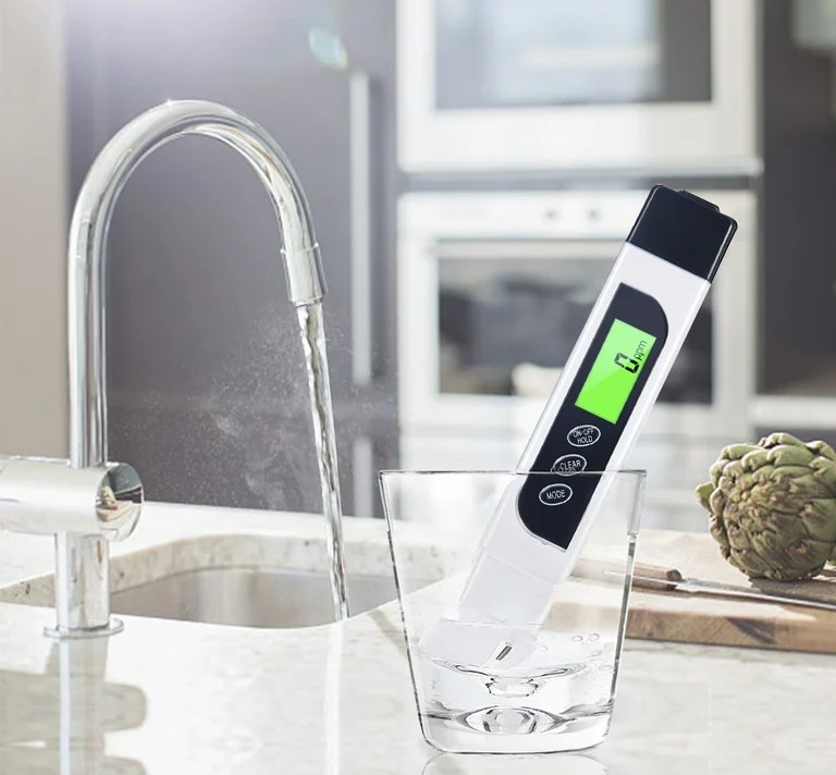 person testing water